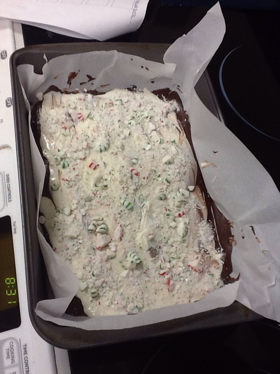 Sprinkle the peppermints on top of the chocolate layers.