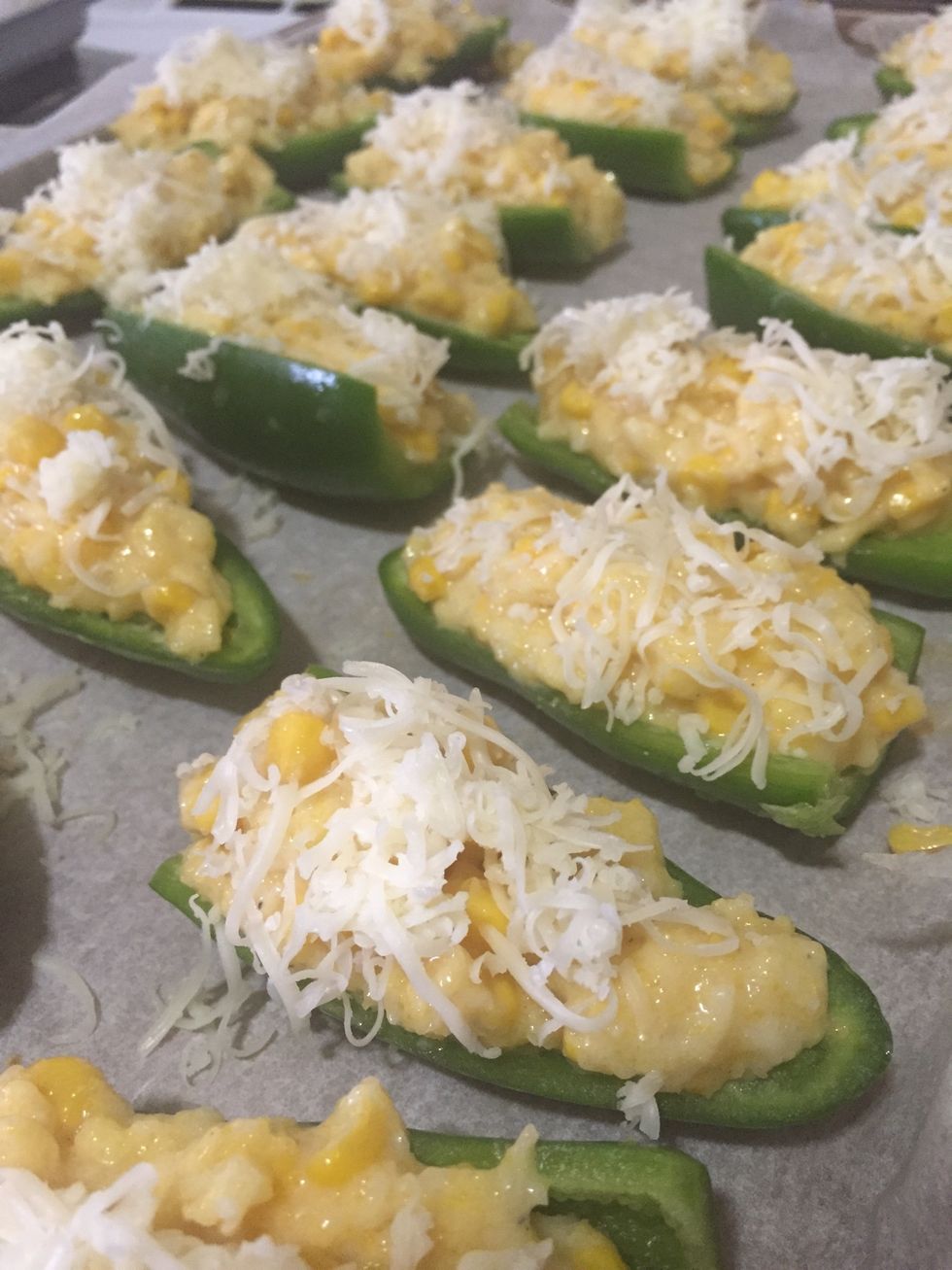 Sprinkle the remaining cheese in the jalapeno. Bake them at 350F for 15-20 min.
