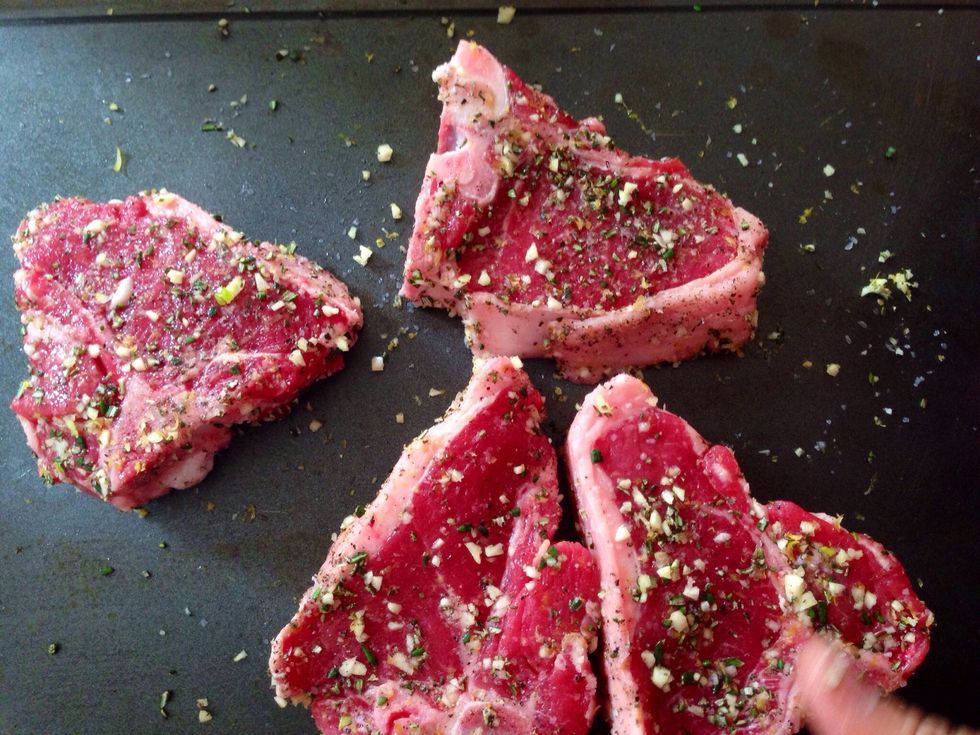 Sprinkle the seasoning and rub into the lamb chops.