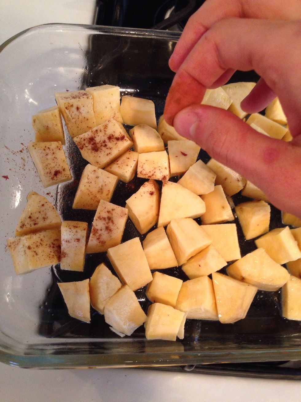 Sprinkle the sweet potato wedges with cinnamon.