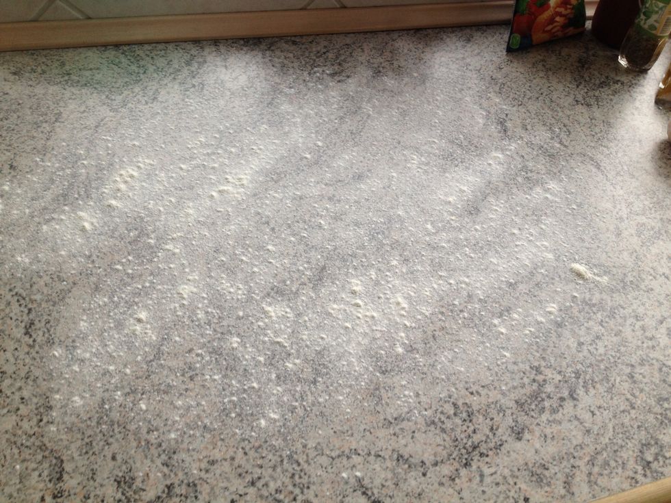 Sprinkle the table with flour