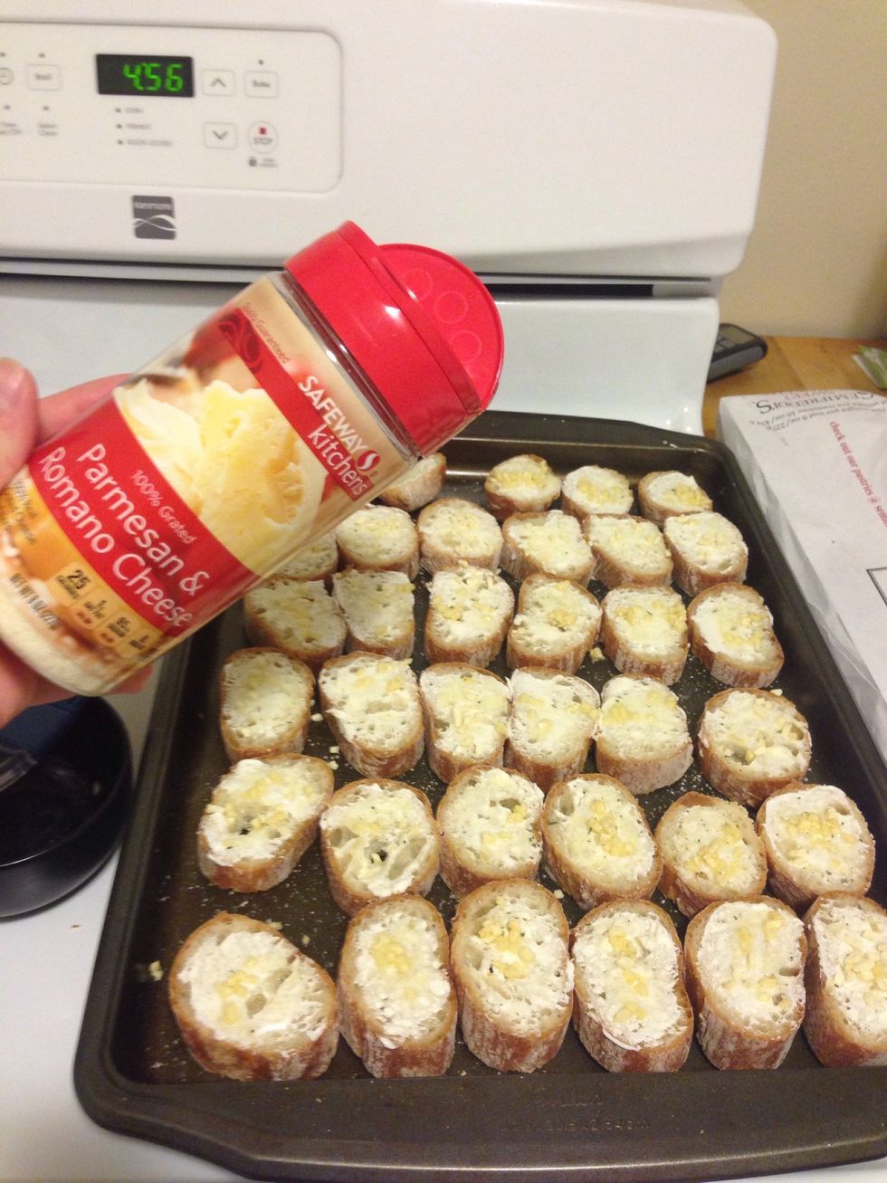 Sprinkle the top with Parmesan cheese. I used about 1 tsp per baguette. (This is a combo Parmesan with Romano that tastes amazing)