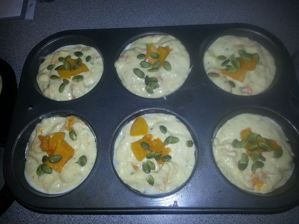 Sprinkle the whole wheat, reserved pumpkin, and the pumpkin seeds over the muffins. Bake in the center of the oven for 20 to 25 minutes, .