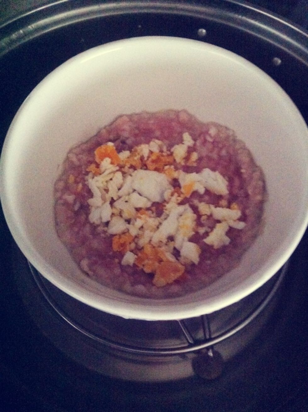 Sprinkle them on top of the meat & steam it till the meat is fully cooked.