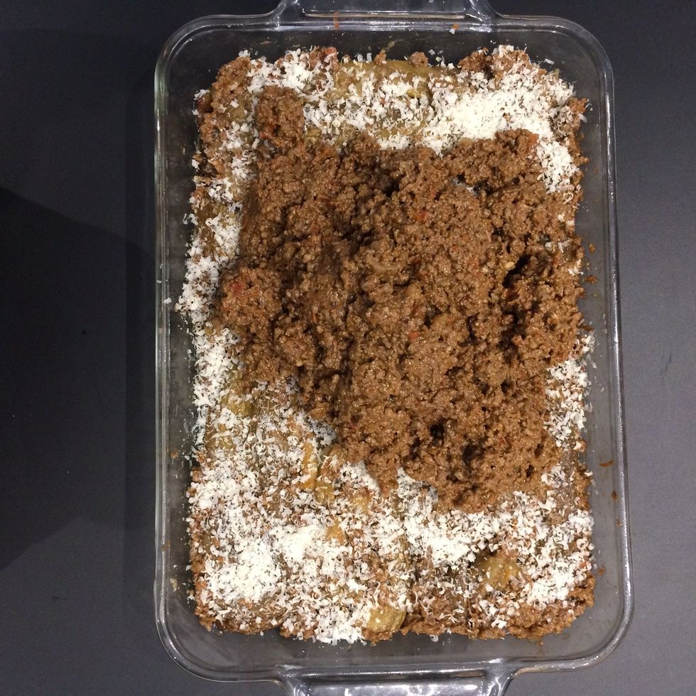 sprinkle with 1 cup of grated parmesan and add the meat..spread in an even layer