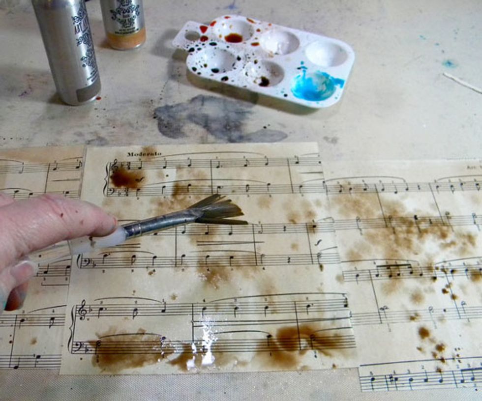 Sprinkle with black ink lightly and let dry.