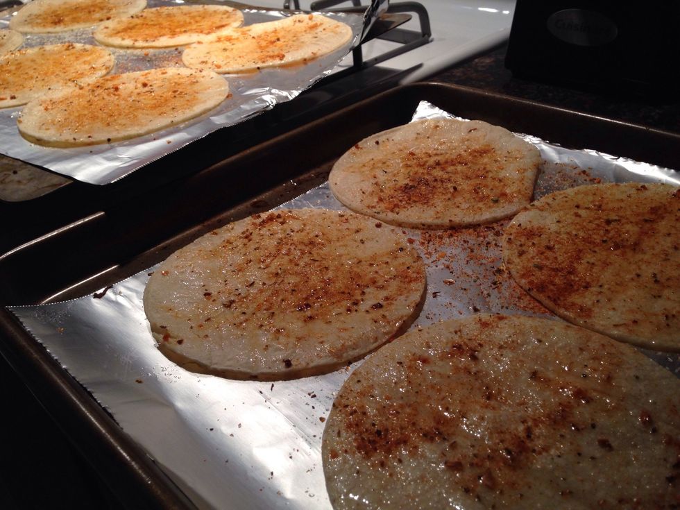 Sprinkle with Cajun seasoning and salt, rub into tortilla. Repeat on reverse side.