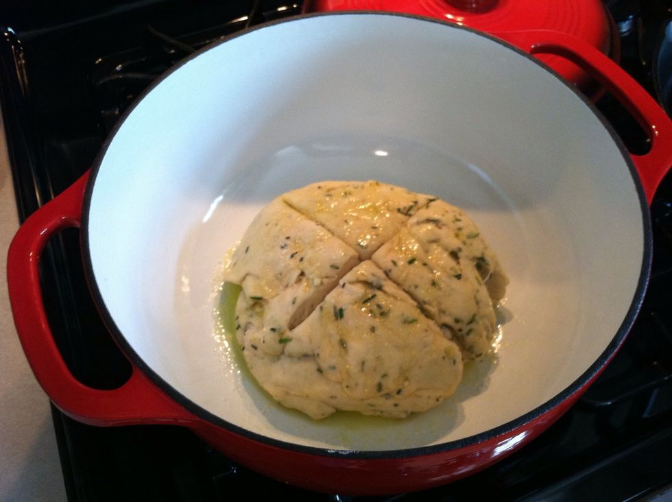 Sprinkle with kosher salt and cut an "X" into the top of the dough. Cover and bake for about 30 minutes.