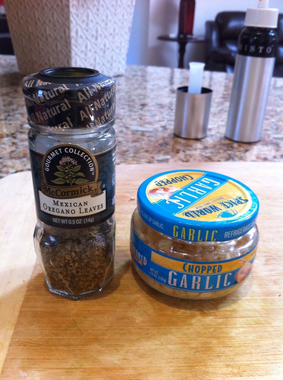 Sprinkle with oregano and garlic.