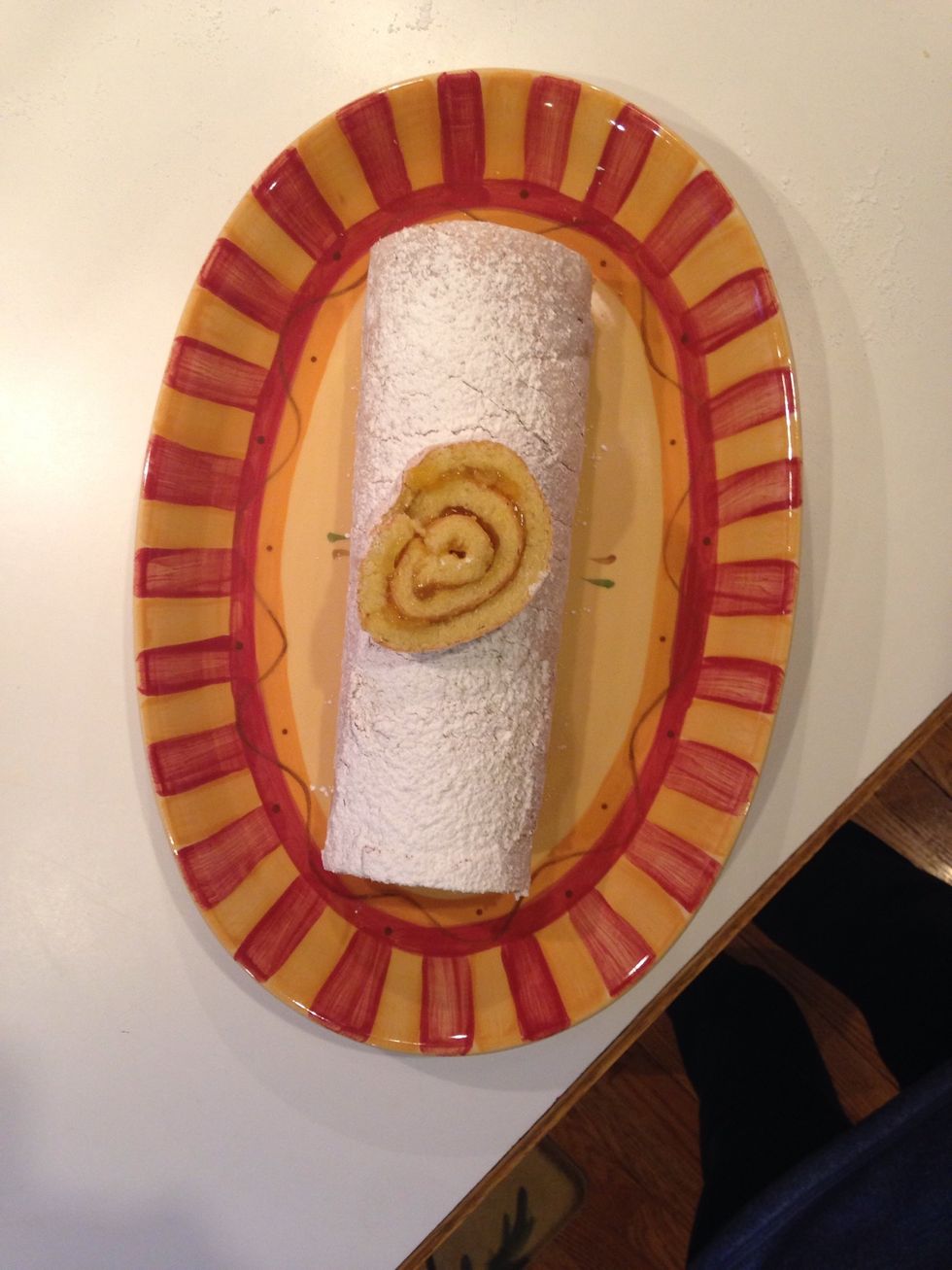 Sprinkle with powdered sugar and trim both ends, use one to try the product and one to garnish with!