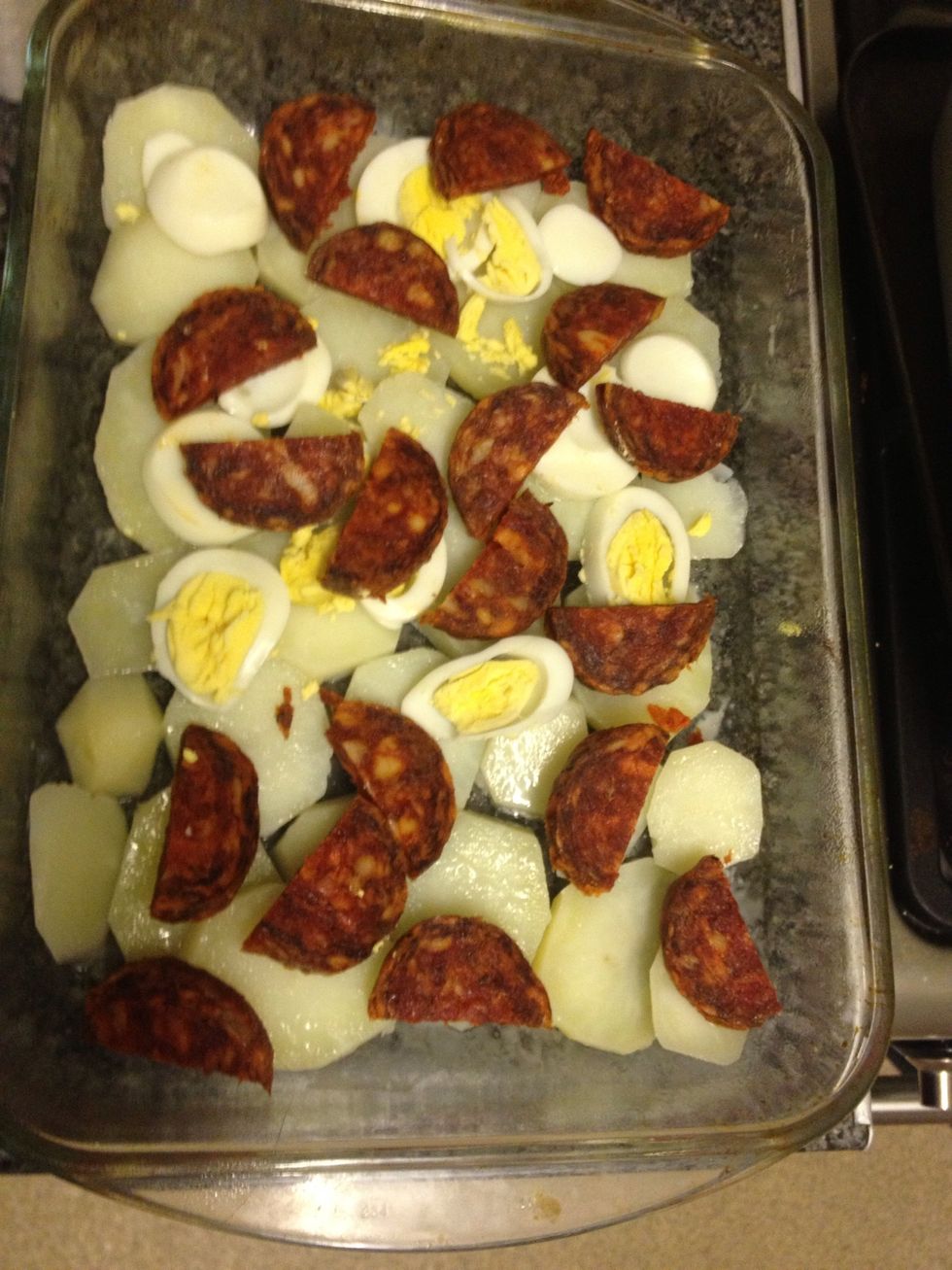 Sprinkle with the sliced chorizo.