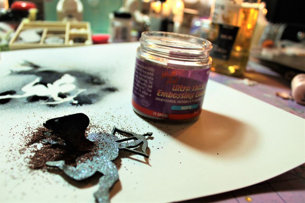 Sprinkle with Ultra Thick Embossing powder in bronze.