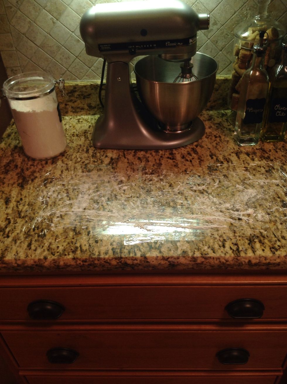 Sprinkle workplace with flour