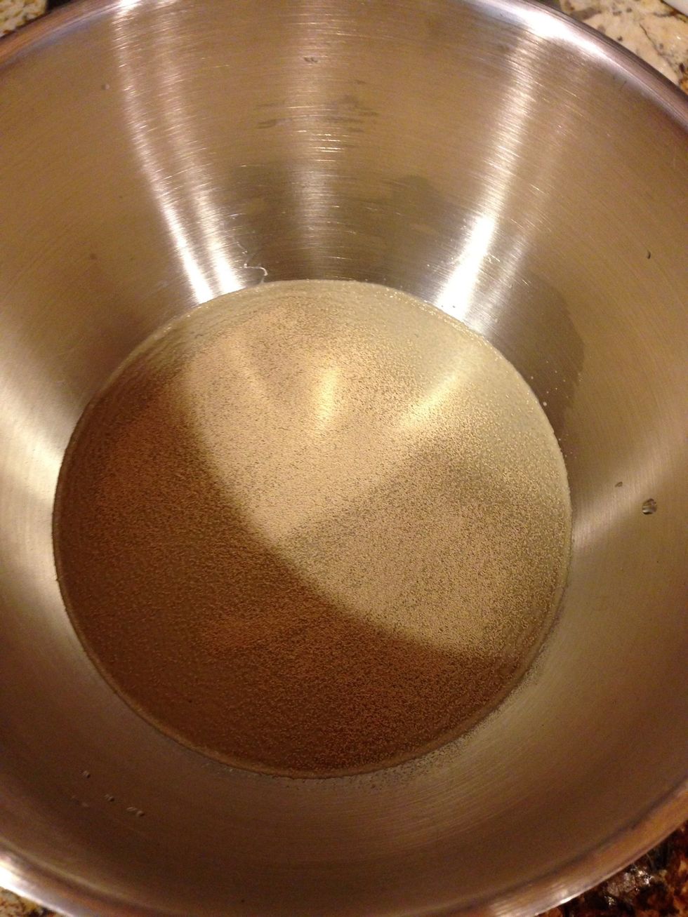Sprinkle yeast over warm water.