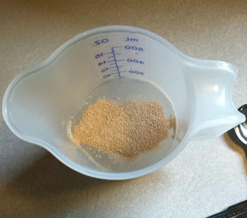 Sprinkle yeast over water and let sit for a couple minutes while measuring out other ingredients.