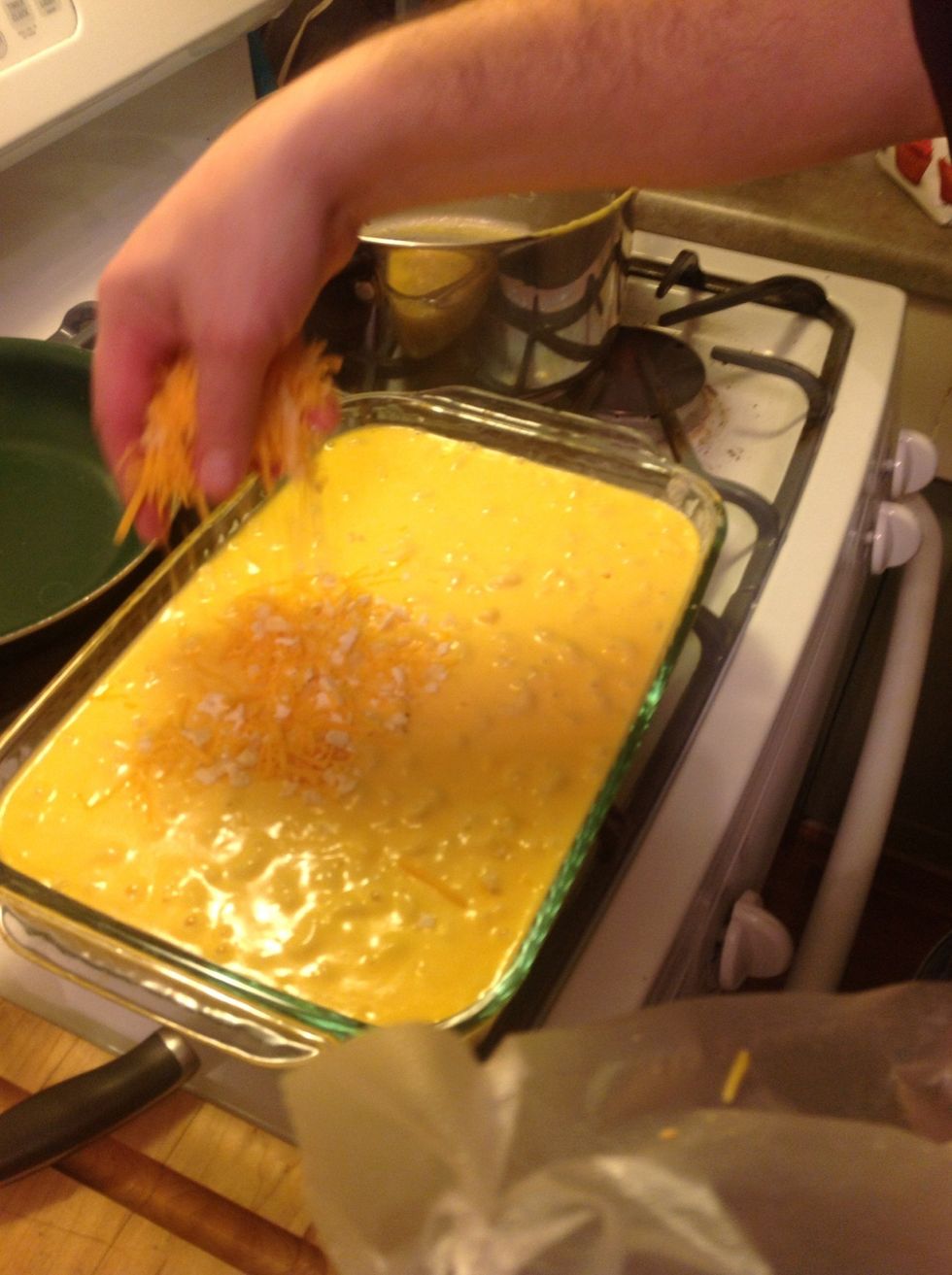 Sprinkle your butter-drenched crackers with cheese mixture on top of the macaroni and cheese.