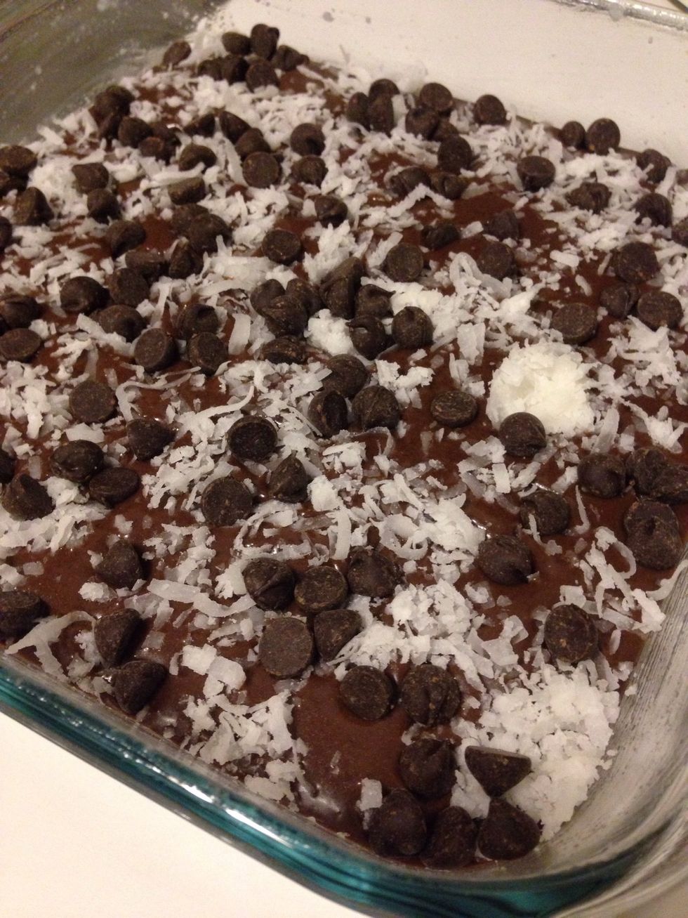 Sprinkle your chocolate chips and optional toppings over the batter and bake in a preheated 350*f oven for 35-40 minutes. (If you can't tell, I love coconut) :)