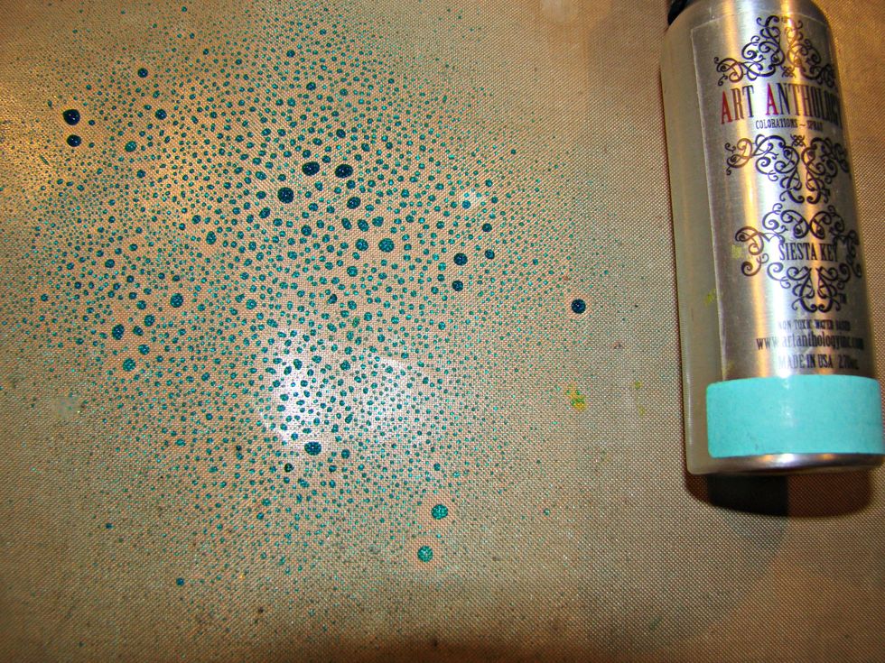 Spritz Coloration sprays on your mat and swipe your tag over randomly, heat set or dry naturally.