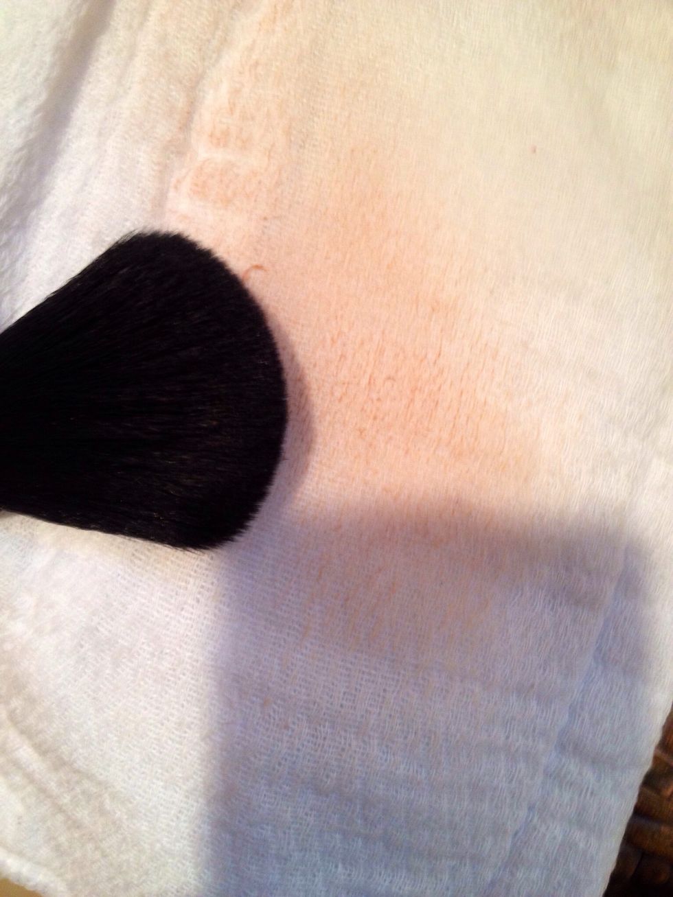 Spritz on brushes and wipe on cloth or towel. The alcohol makes the brushes dry more quickly rather than if it were just water and soap.