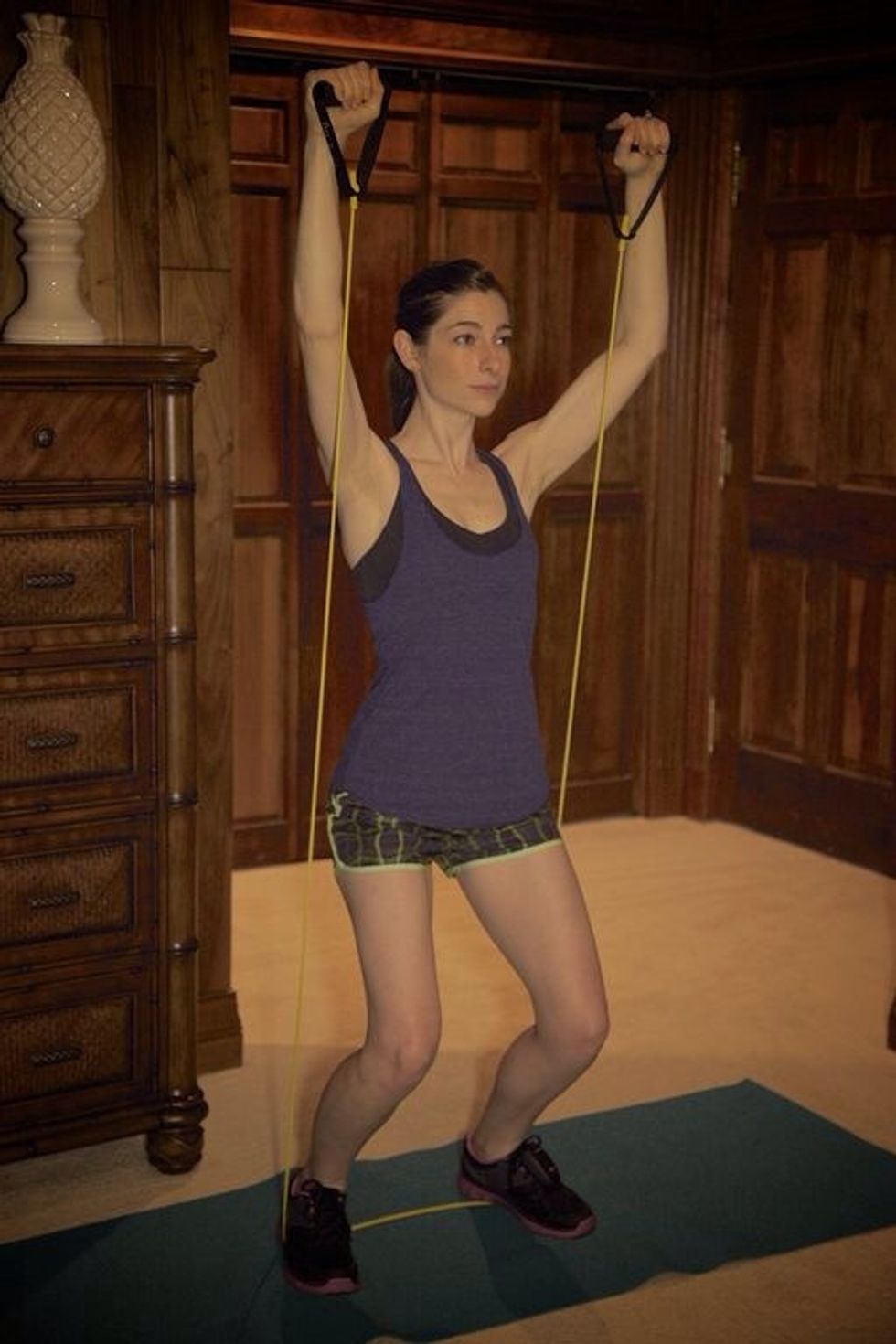 Squat Press: Get ready to feel it in your arms and legs and. Squat down and stay in squatting position while you raise hands above your head. Rise back up and continue for one minute.