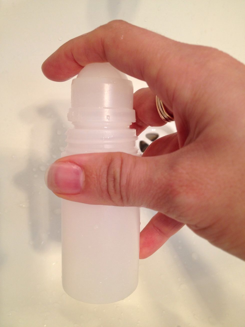 Squeeze a small amount of the soap into your bottles and add some warm water. Swish it around, put the lid on and shake, or use a brush or your fingers to get in there. Whatever works best!