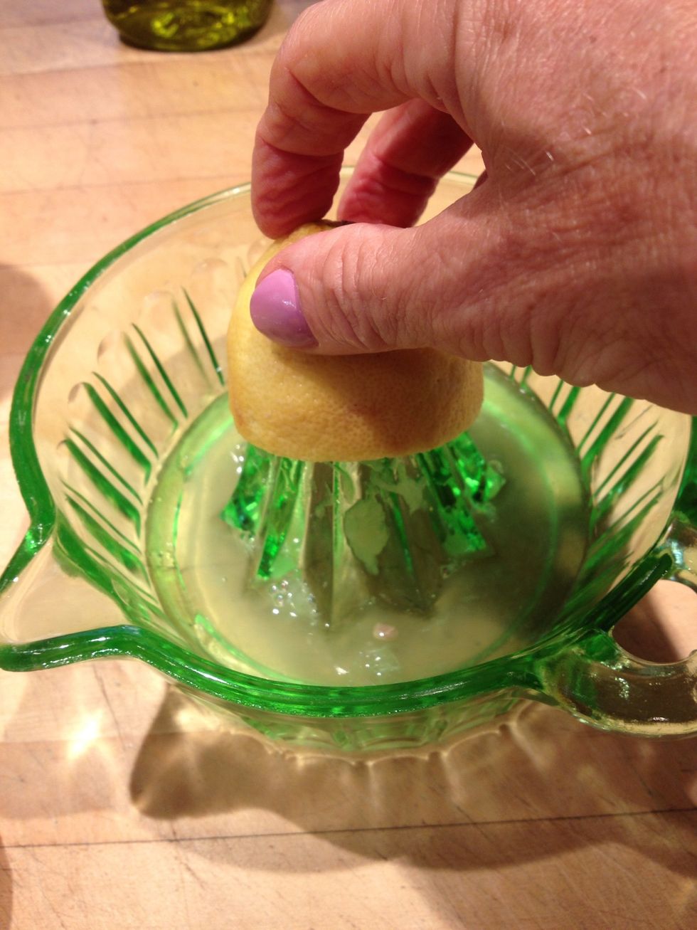 Squeeze and add the lemon and orange juice. I didn't have an orange on hand so just poured in a half cup of OJ.