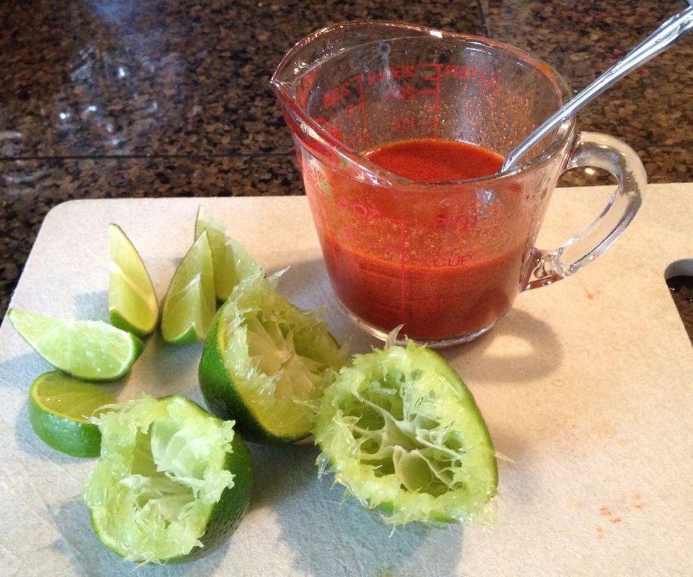 Squeeze in fresh lime juice (about three halves). Save the other half for squeezing into finished soup.