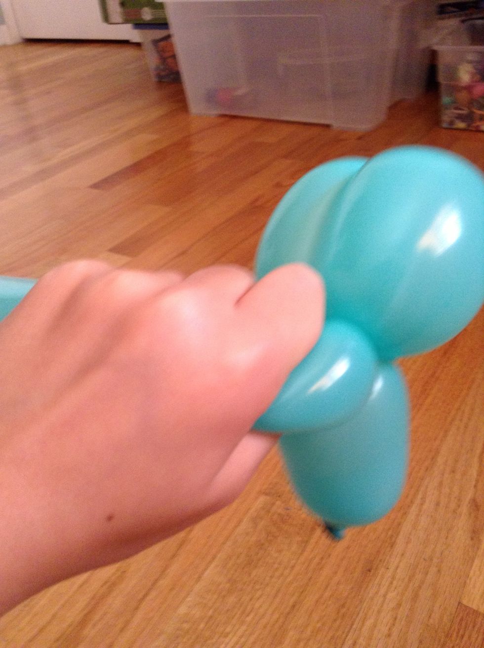 SQUEEZE!!!! ( It pushes more air to the back so it's less likely to pop on you )