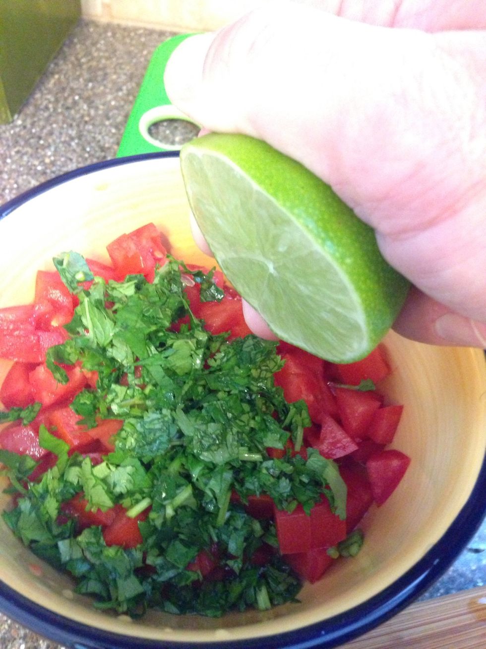 Squeeze juice of a lime into the salsa.