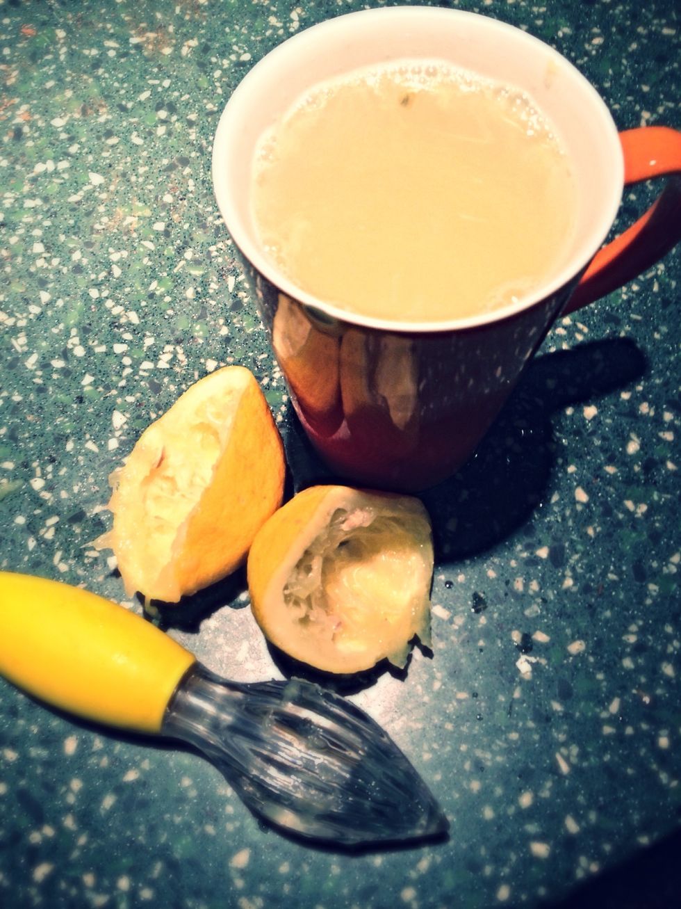 Squeeze lemon into hot water and get out the fibrous pulp for extra nutrition!