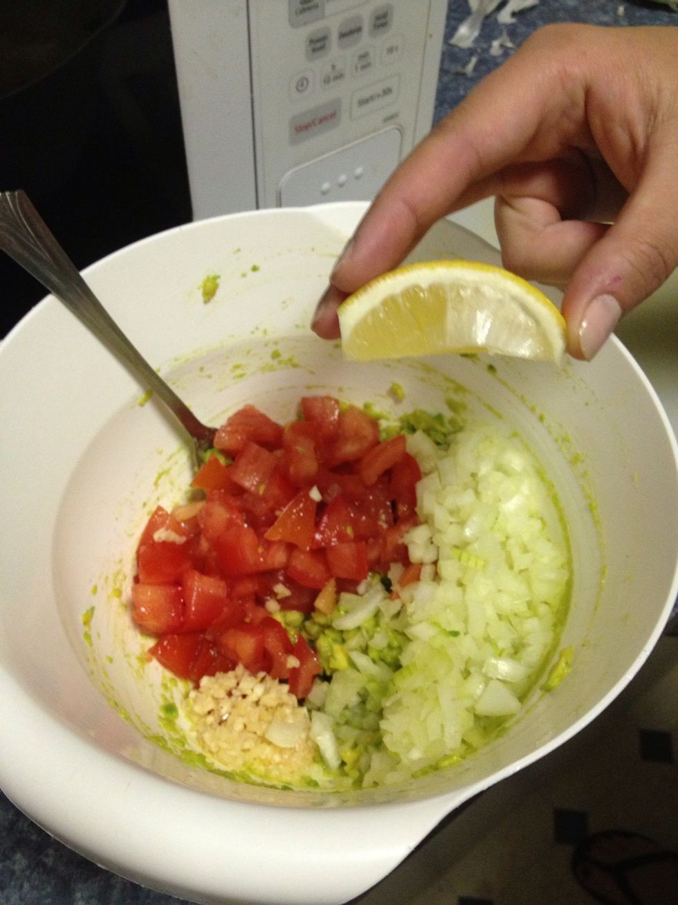 Squeeze lemon slices into mixture