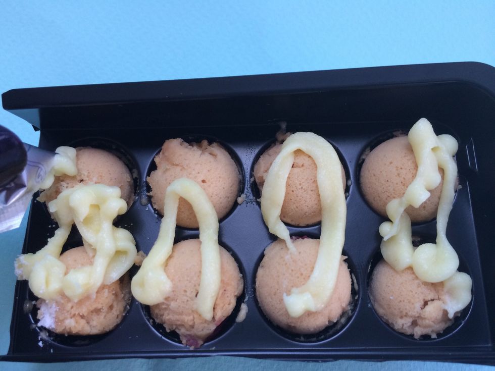 Squeeze Mayo onto Takoyaki