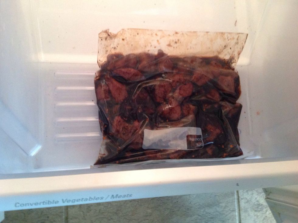 Squeeze most of the air out and place it flat in the refrigerator and let it marinade overnight.