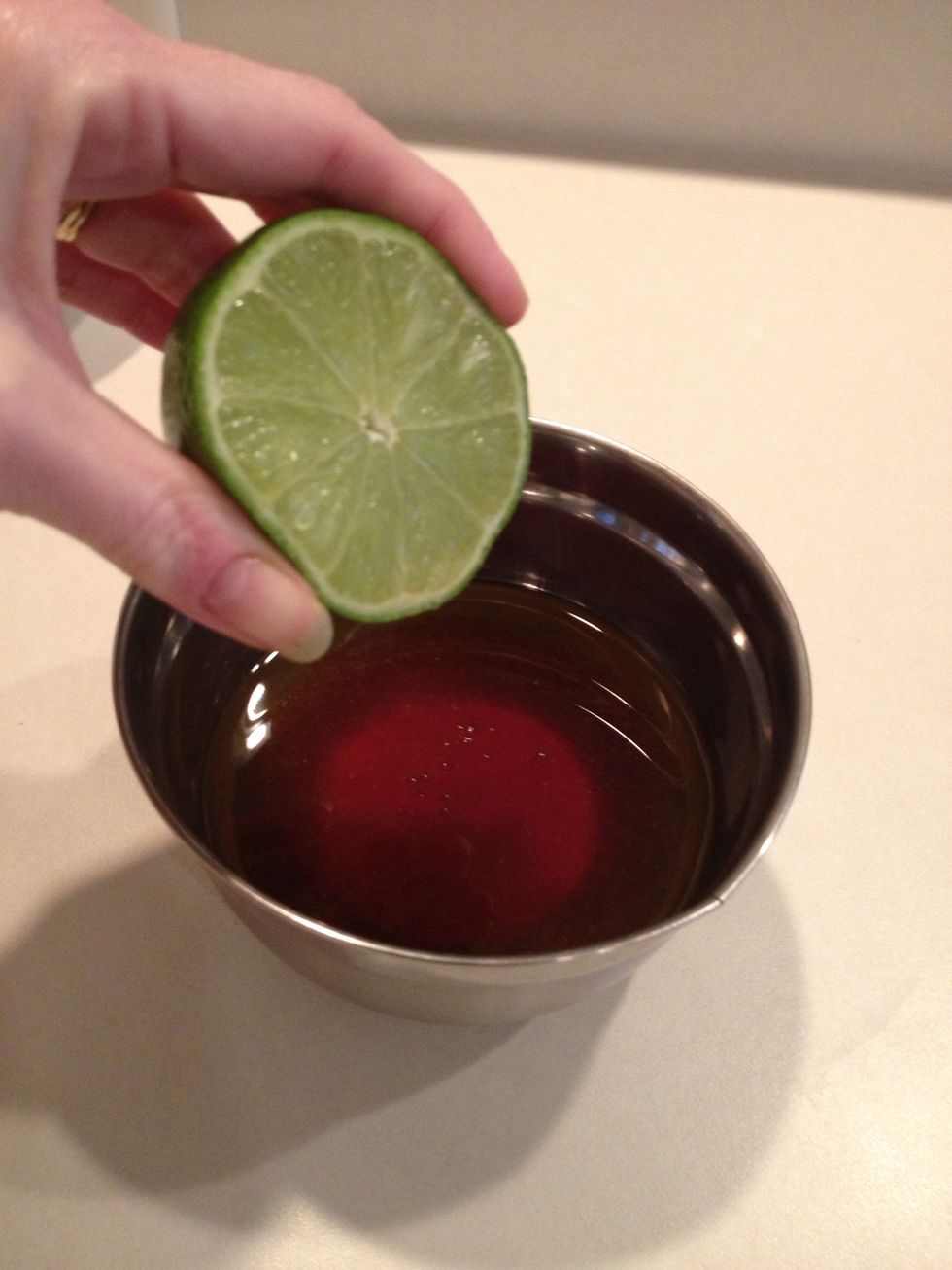 Squeeze one lime. I cut my lime in half and squeeze both sides into the sauce.