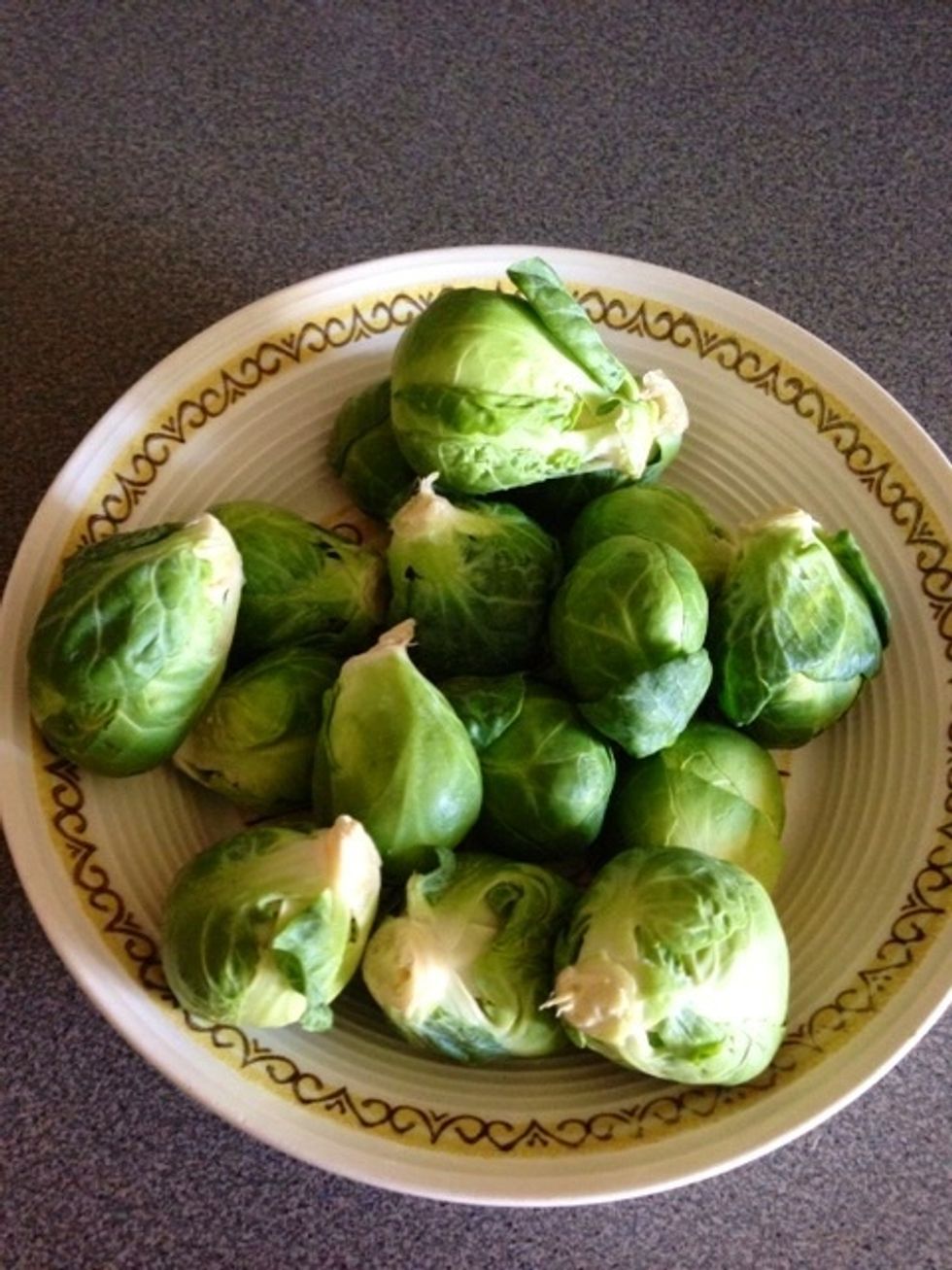Squeeze one of the lemons over top of the brussels sprouts.