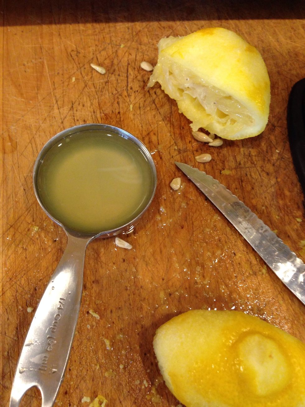 Squeeze out 1/4 cup of lemon juice.