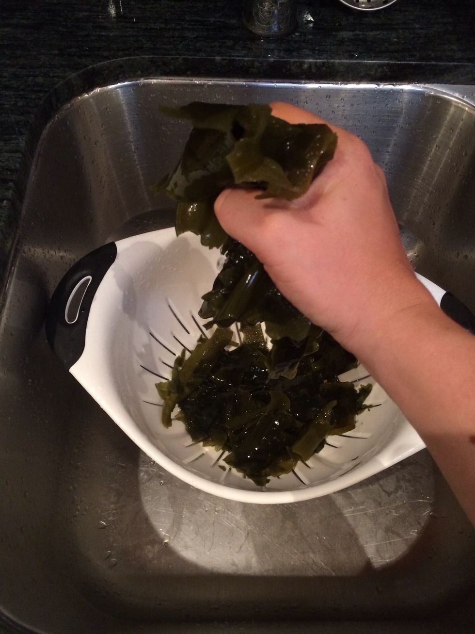 Squeeze out excess moisture, and place on a paper towel. Pat dry.