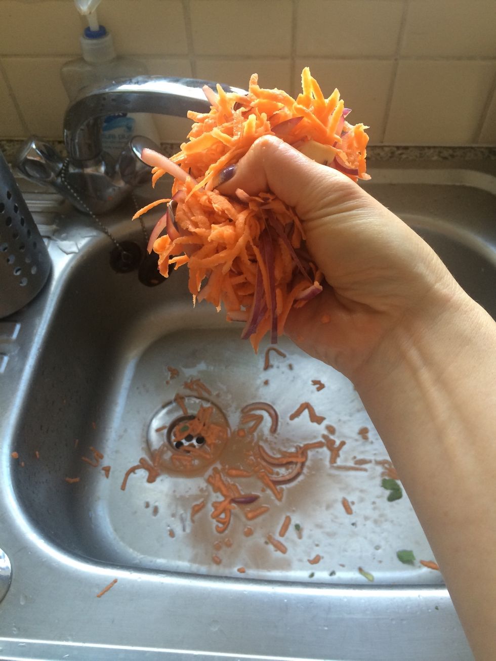 Squeeze out excess water from the potato mixture