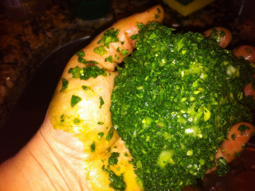 Squeeze out liquid over sink. Try not to lose too much spinach in the process. It's ok if it's a little wet.