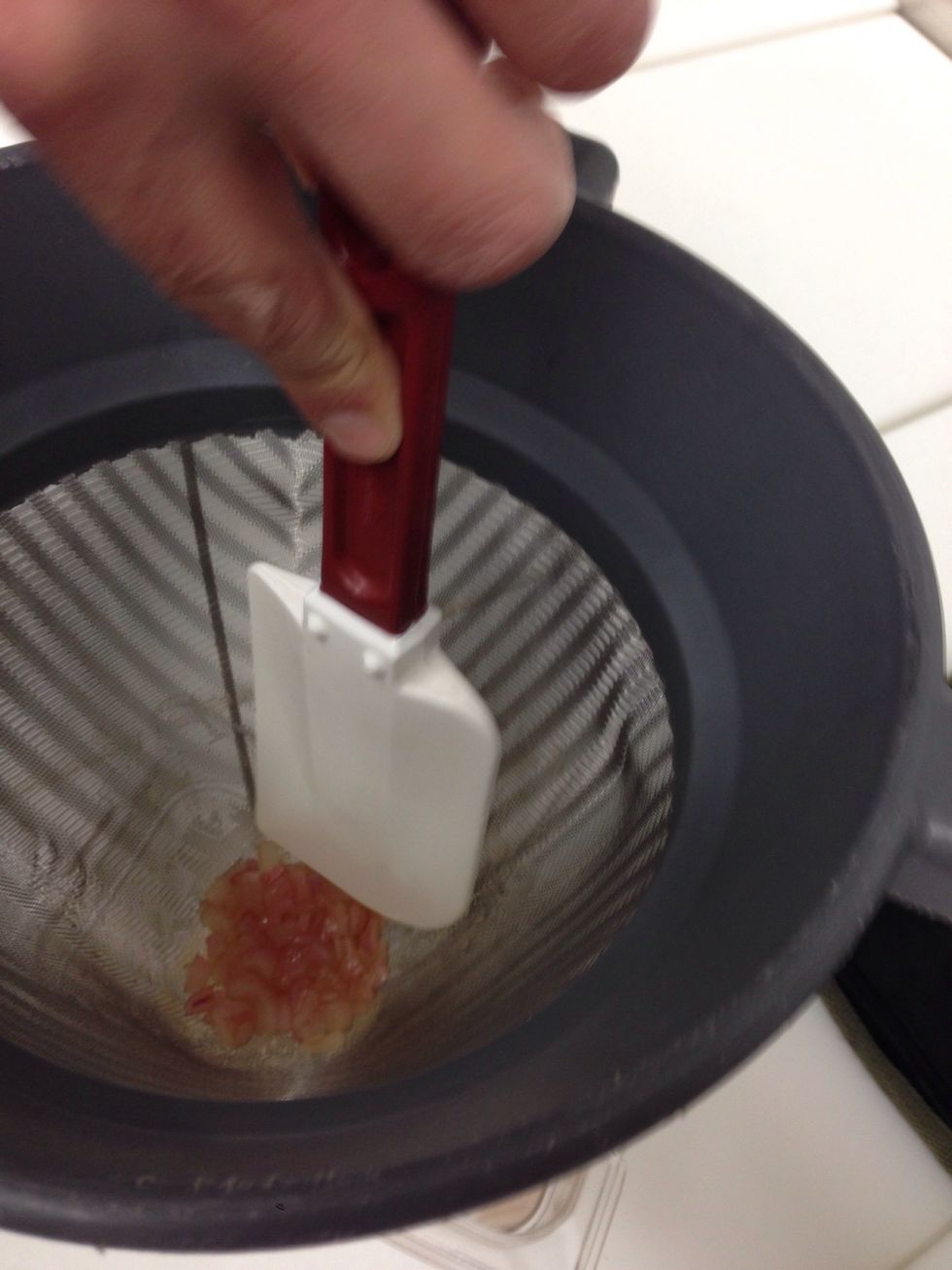 Squeeze out the liquid and reserve.