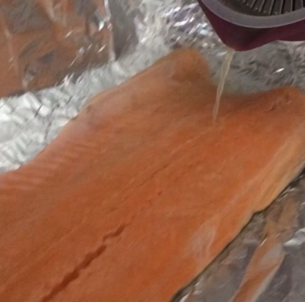 Squeeze some lemons or limes over the salmon or simply buy line/lemon juice. I prefer freshly squeezed.