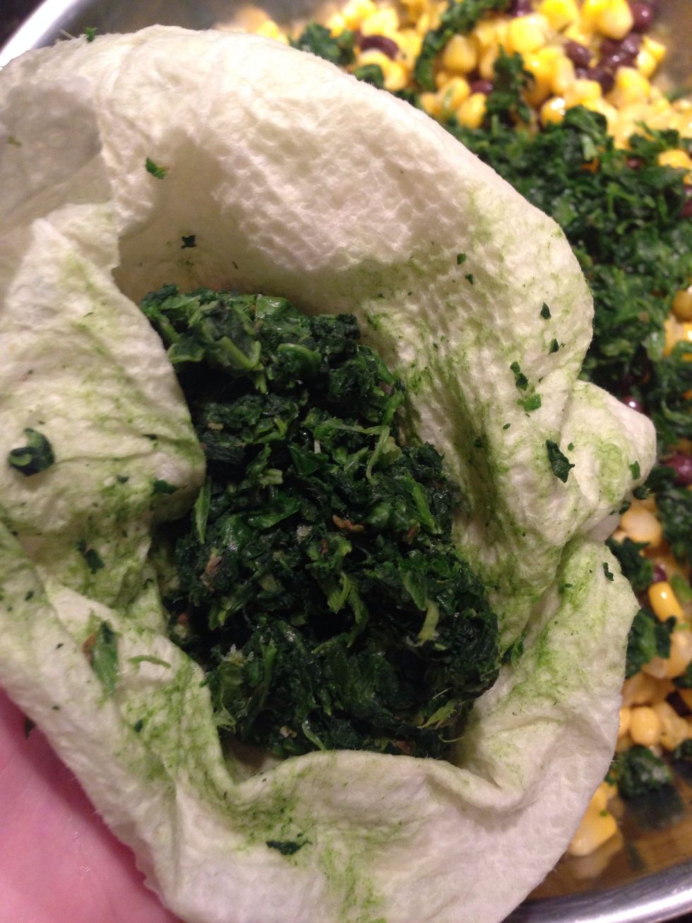 Squeeze spinach out with a paper towel and add it to the bowl.