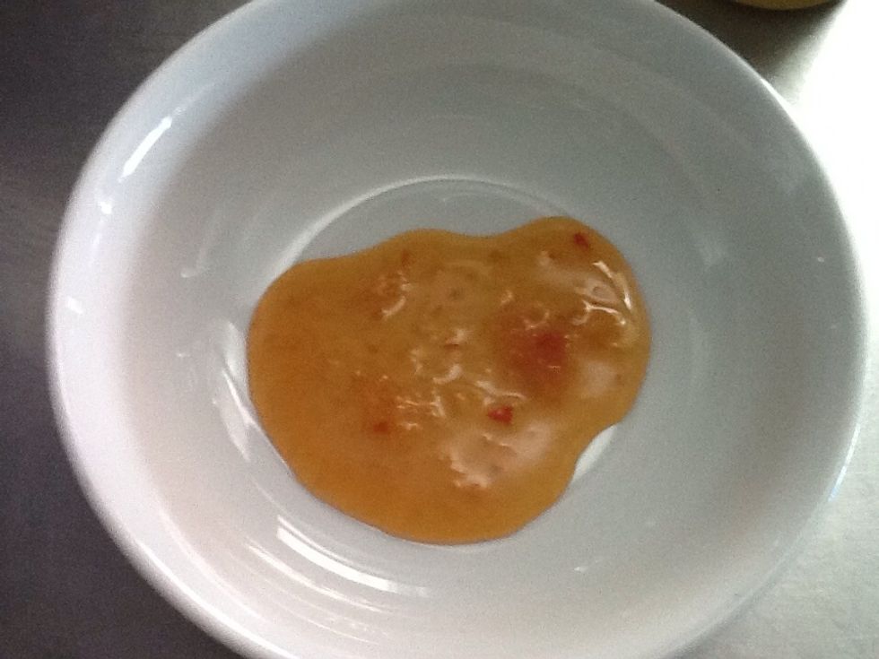 Squeeze sweet chilli sauce on bowl