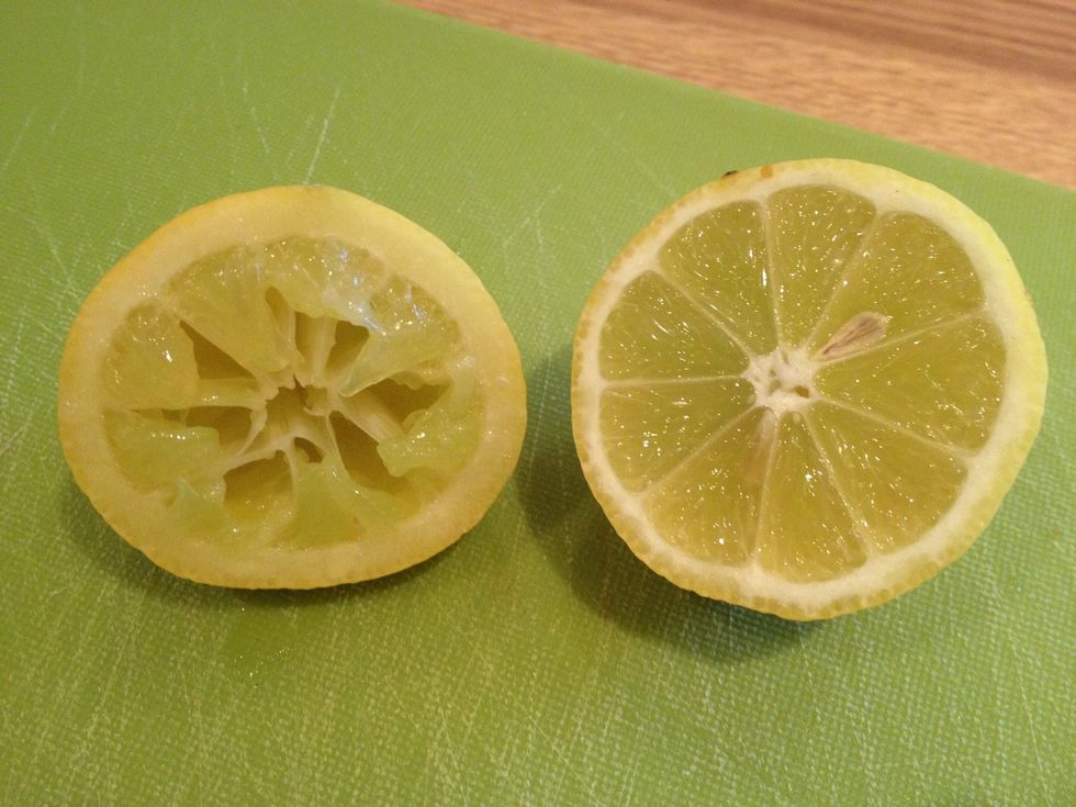 Squeeze the juice of half a lemon into a mug and add one slice of lemon