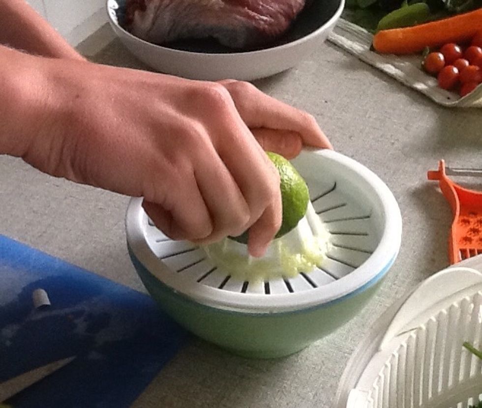 Squeeze the juices off the lime. This is added to the salad dressing.