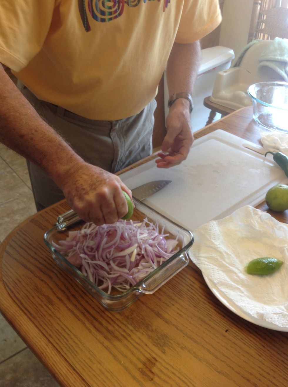 Squeeze the limes over the fish and onions!