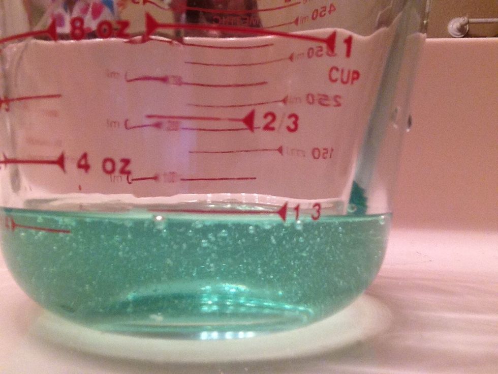 Squeeze the shampoo to a third of a cup. I just used $1.00 shampoo, but you can also use hand soap or dish soap!