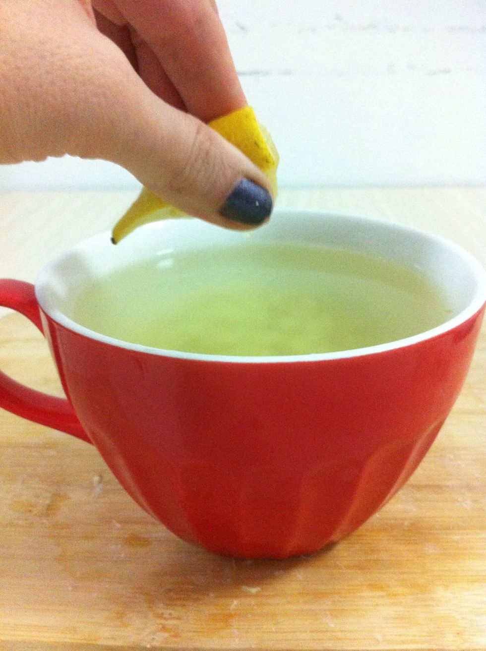 Squeeze two or three sections of lemon to taste.