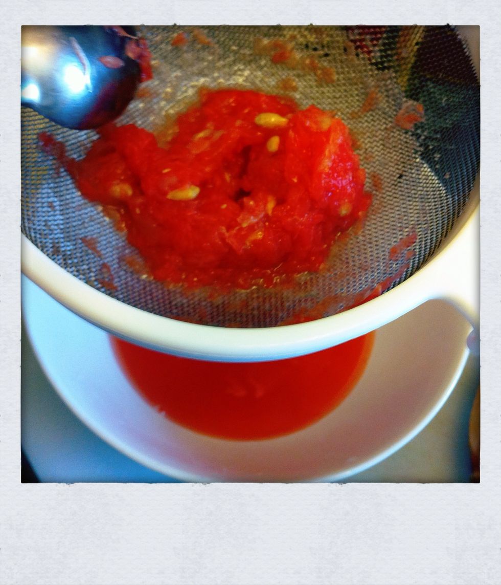 Squeeze your 2 ruby grapefruits and 1 of the lemons through a sieve to prevent bits and pips going into your drink