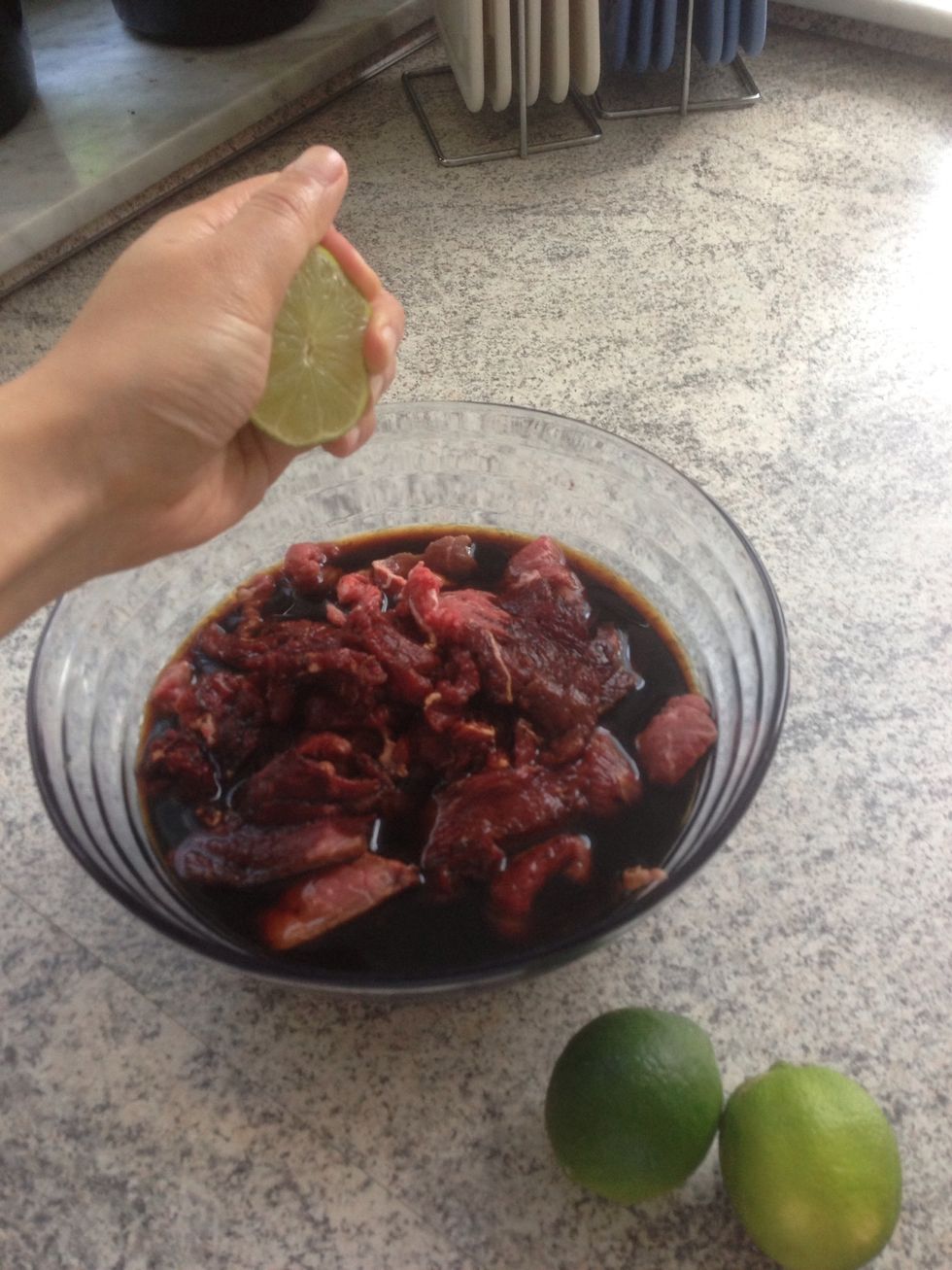 Squeeze your calamansi or lime into it and Mix it well! Steep it for about 1 Hour in the fridge. Meanwhile slice your onions. You can prepare you rice if you want to serve it with your Bistek.